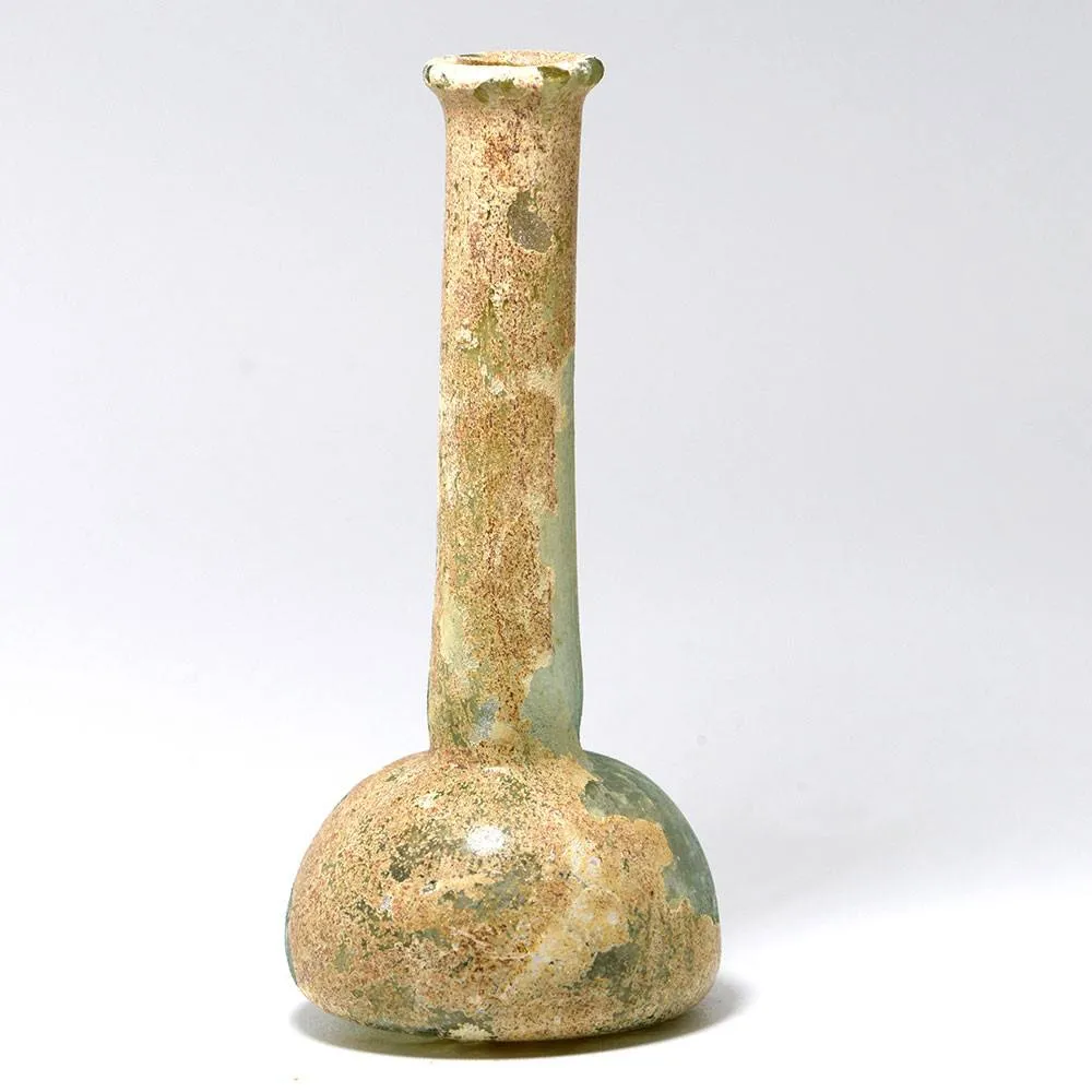 A tall Roman Glass Ungentarium, Roman Imperial, 1st century CE