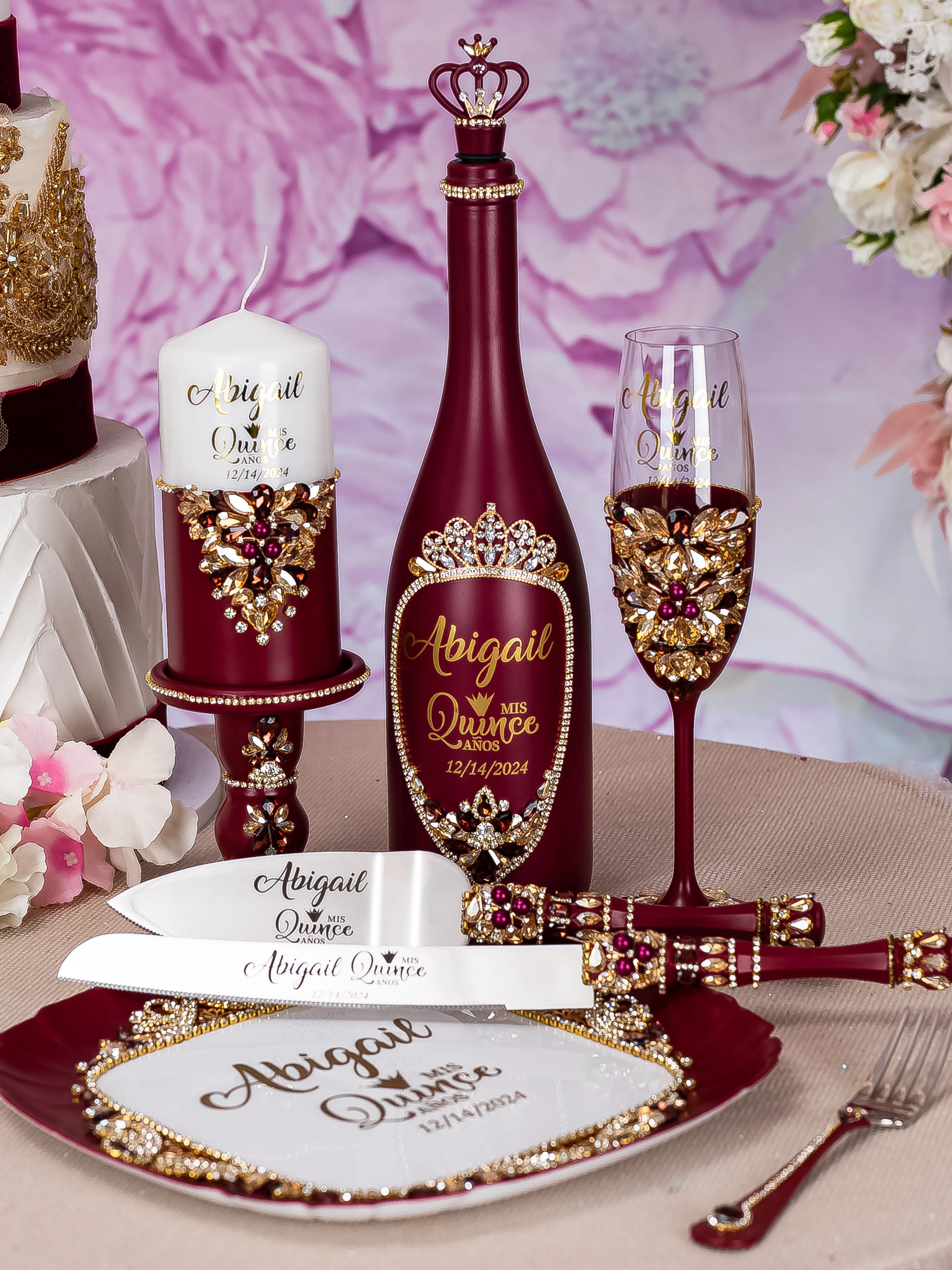 Burgundy quinceanera brindis package with bottle and candle